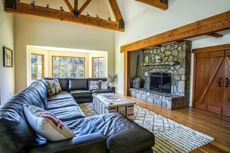 Living room with fireplace and large couch