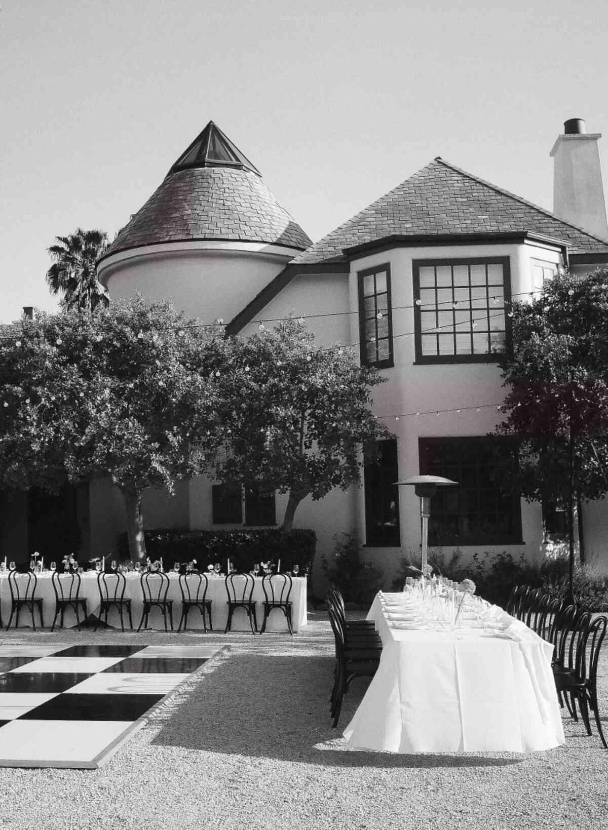 Brown tile hallway with open doors